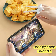 Playing games with fingers chopsticks snacking clips not dirty hands chopsticks finger loops