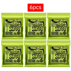 6 sets of Ernie Ball Slinky guitar strings (models 2003, 2215, 2223, 2221, nickel - wound) for electric & acoustic guitars