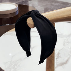 Fashionable fabric cross bow headband