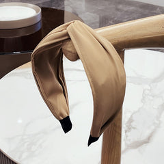 Fashionable fabric cross bow headband