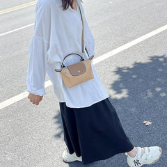 Retro fashion versatile women's bag, shoulder crossed, carrying high-end nylon dumpling bag