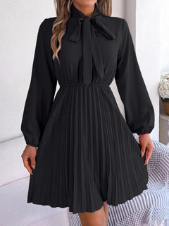 Spring and summer temperament tied waist long sleeved pleated skirt